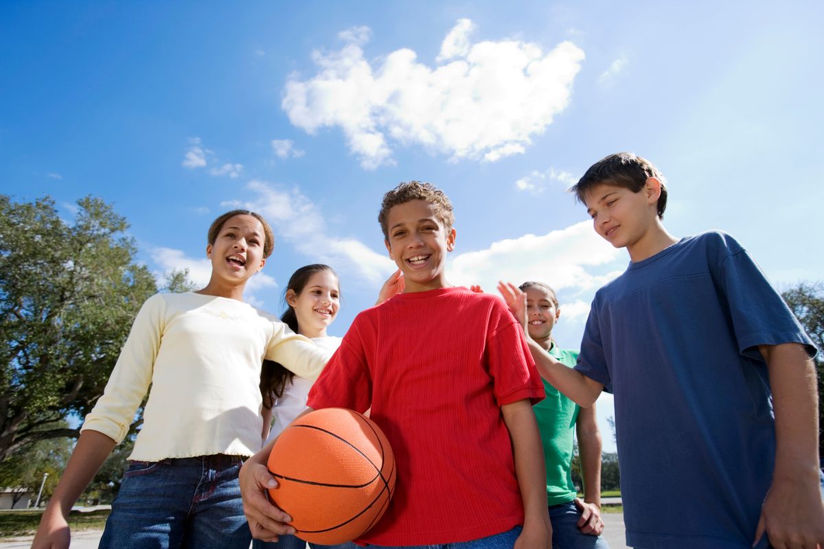 Kids playing basketball at a rec program